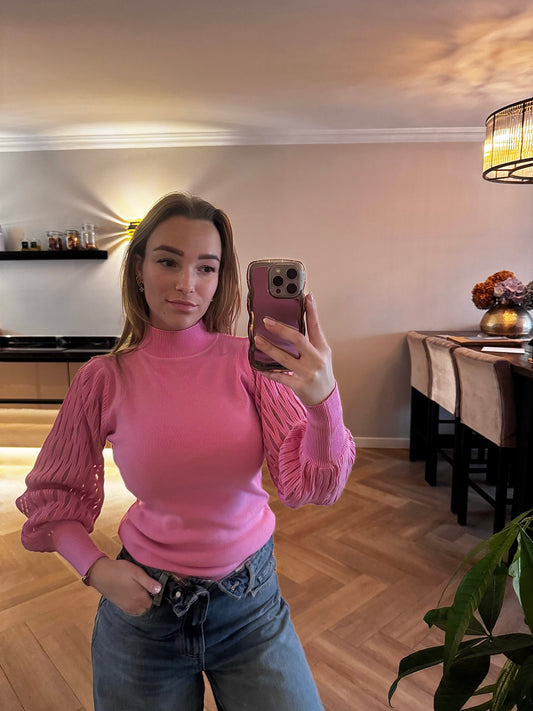 Roze coltrui met plissé mouwen